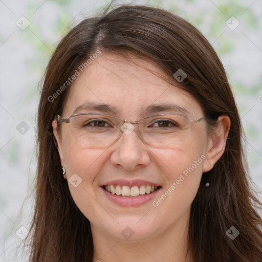 Joyful white adult female with long  brown hair and brown eyes