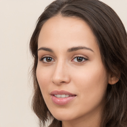 Neutral white young-adult female with long  brown hair and brown eyes