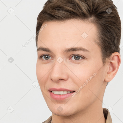 Joyful white young-adult female with short  brown hair and brown eyes