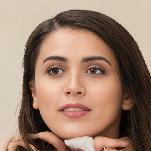 Joyful white young-adult female with medium  brown hair and brown eyes