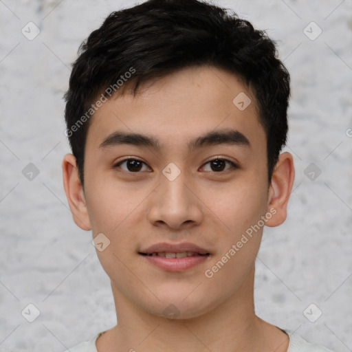 Joyful asian young-adult male with short  brown hair and brown eyes