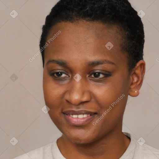 Joyful black young-adult female with short  black hair and brown eyes