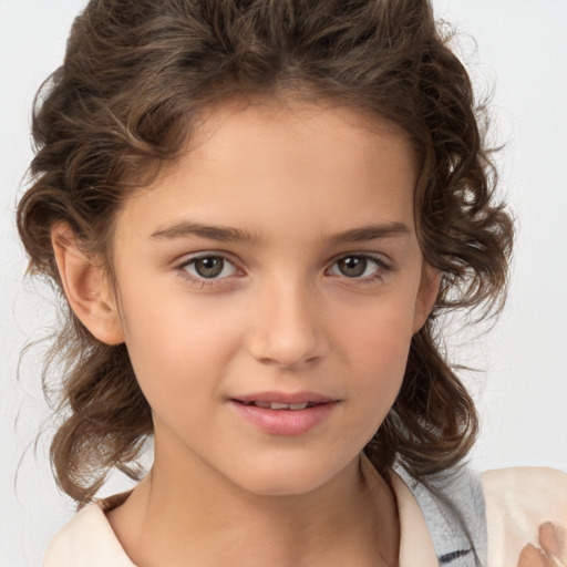 Joyful white child female with medium  brown hair and brown eyes