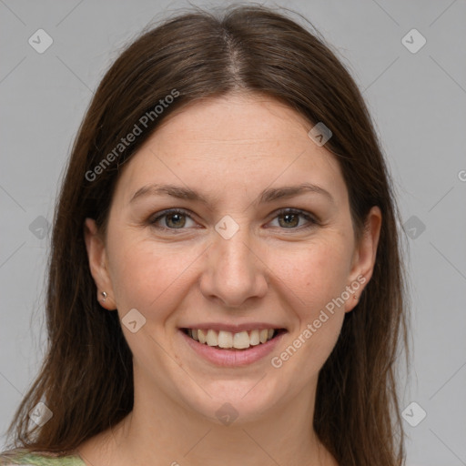 Joyful white young-adult female with medium  brown hair and grey eyes