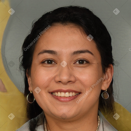 Joyful white adult female with medium  brown hair and brown eyes