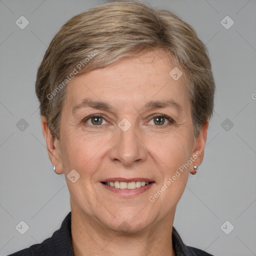 Joyful white adult female with short  brown hair and grey eyes