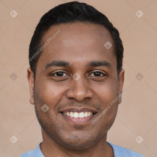 Joyful latino young-adult male with short  black hair and brown eyes