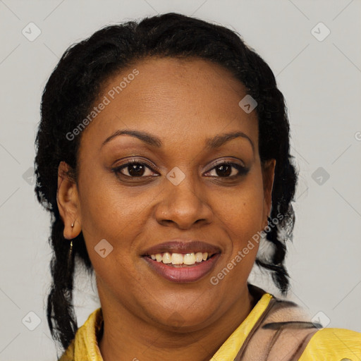 Joyful latino adult female with medium  brown hair and brown eyes