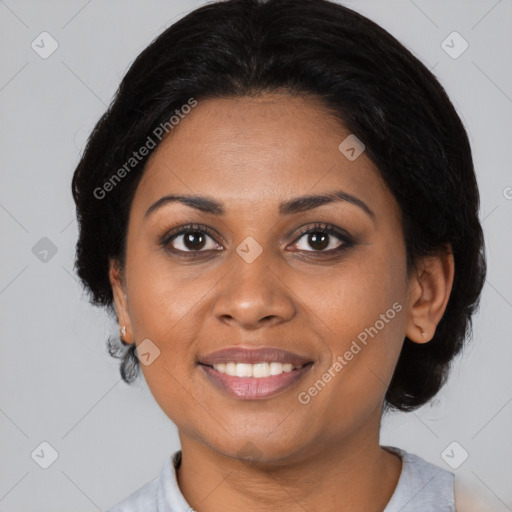 Joyful black young-adult female with medium  brown hair and brown eyes