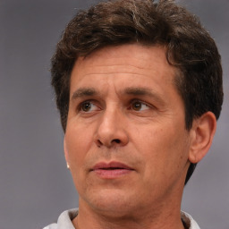 Neutral white adult male with short  brown hair and brown eyes