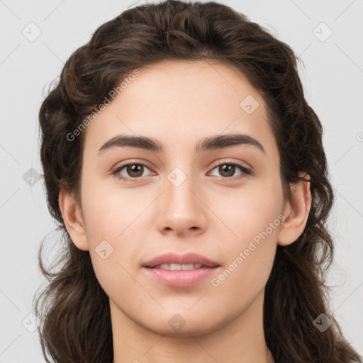 Neutral white young-adult female with long  brown hair and brown eyes