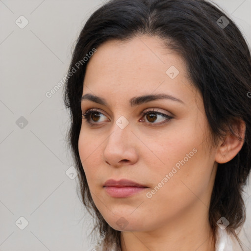 Neutral white young-adult female with medium  brown hair and brown eyes