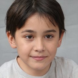 Joyful white child female with short  brown hair and brown eyes