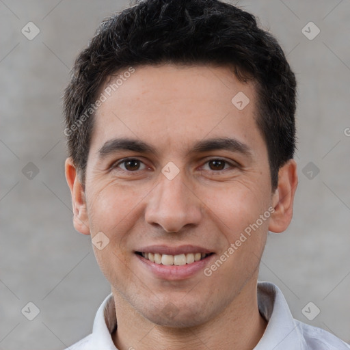 Joyful white young-adult male with short  brown hair and brown eyes