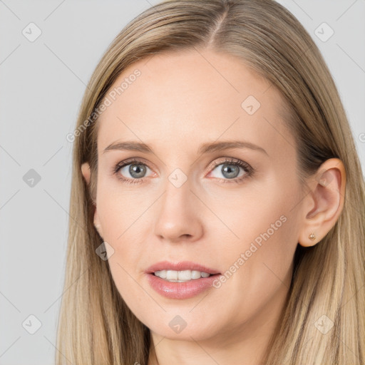 Joyful white young-adult female with long  brown hair and grey eyes