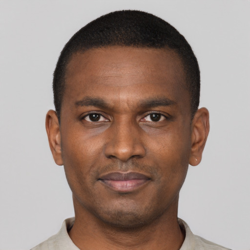 Neutral black young-adult male with short  brown hair and brown eyes