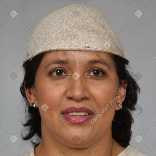 Joyful black adult female with medium  brown hair and brown eyes