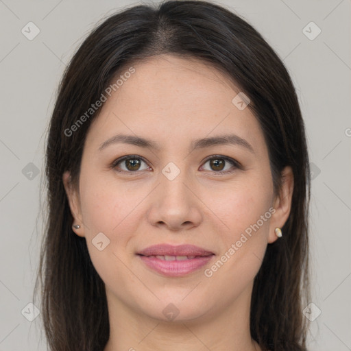 Joyful white young-adult female with long  brown hair and brown eyes