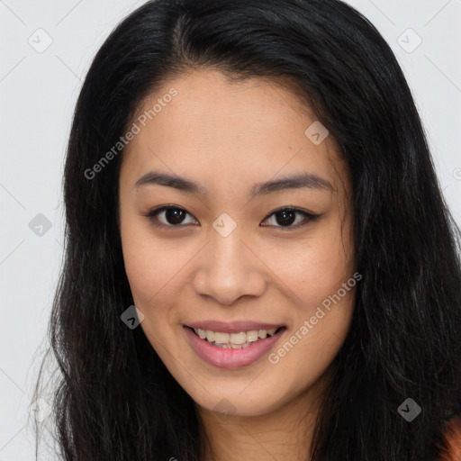 Joyful asian young-adult female with long  brown hair and brown eyes