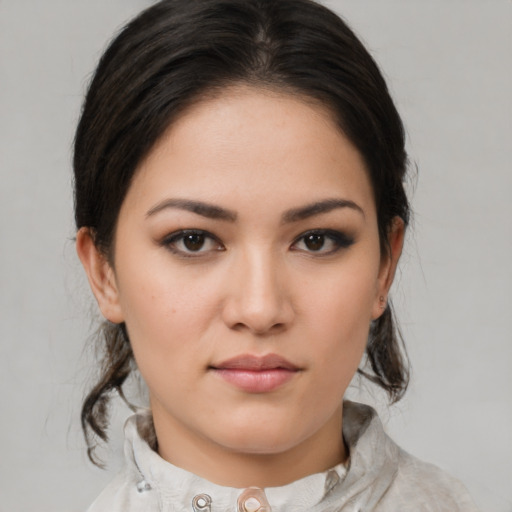 Neutral white young-adult female with medium  brown hair and brown eyes