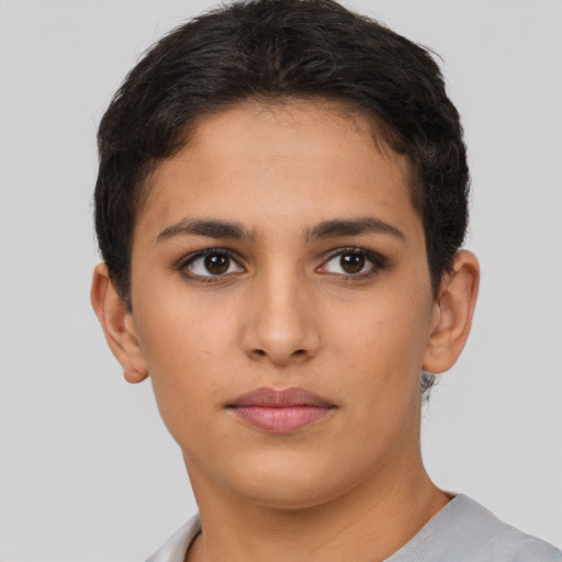 Neutral latino young-adult female with short  brown hair and brown eyes