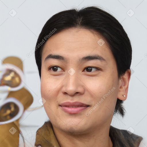 Joyful asian young-adult female with medium  brown hair and brown eyes