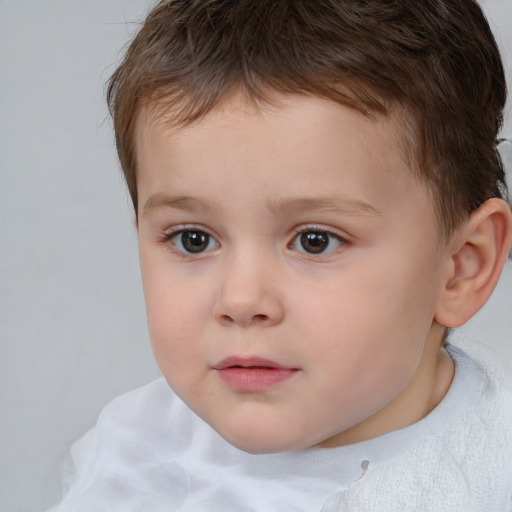 Neutral white child male with short  brown hair and brown eyes