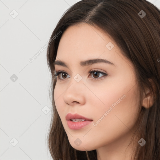 Neutral white young-adult female with long  brown hair and brown eyes