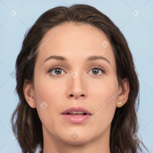 Neutral white young-adult female with long  brown hair and brown eyes