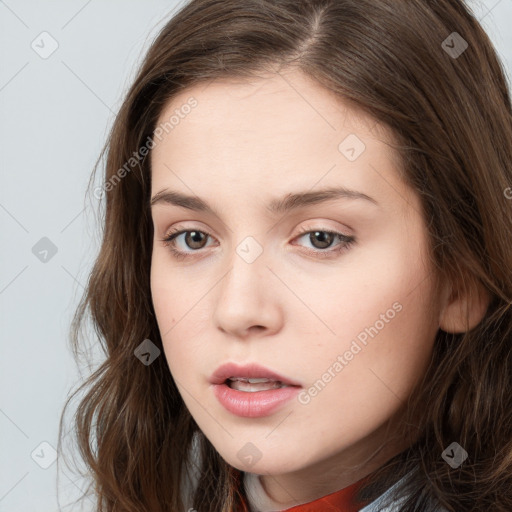 Neutral white young-adult female with long  brown hair and brown eyes