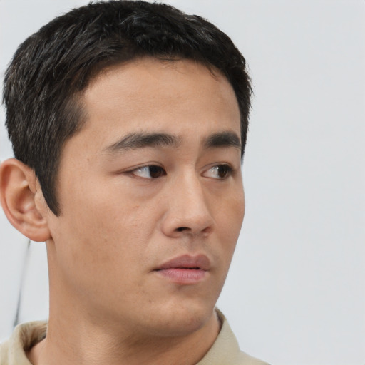 Neutral asian young-adult male with short  brown hair and brown eyes