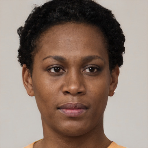 Neutral black young-adult female with short  brown hair and brown eyes