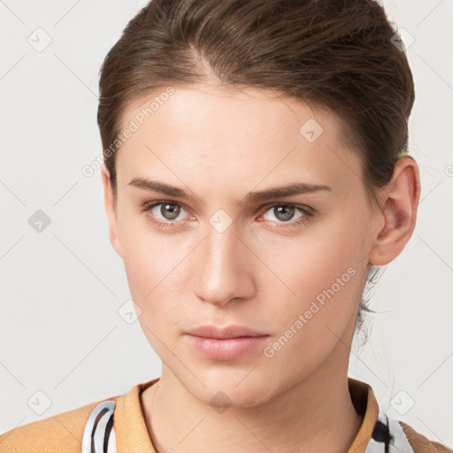 Neutral white young-adult female with short  brown hair and brown eyes