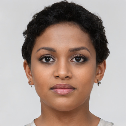Neutral latino young-adult female with short  brown hair and brown eyes