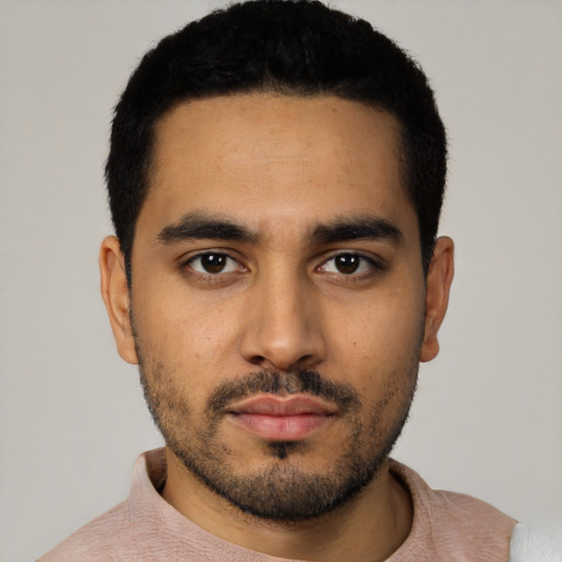 Neutral latino young-adult male with short  black hair and brown eyes