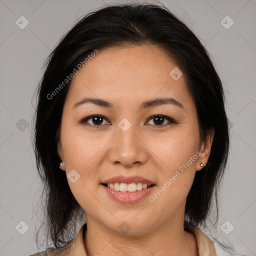 Joyful latino young-adult female with medium  brown hair and brown eyes