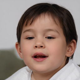 Joyful white child female with short  brown hair and brown eyes