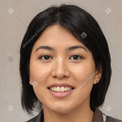 Joyful asian young-adult female with medium  black hair and brown eyes