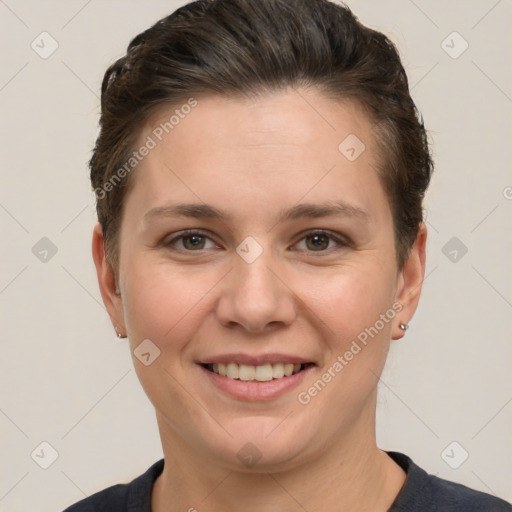 Joyful white young-adult female with short  brown hair and grey eyes