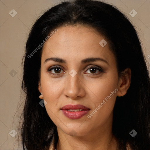 Joyful latino young-adult female with long  brown hair and brown eyes