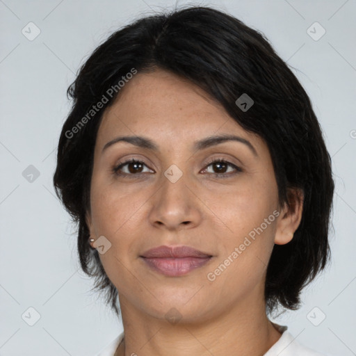 Joyful asian adult female with medium  brown hair and brown eyes