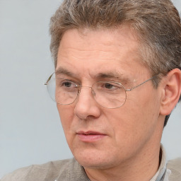 Neutral white middle-aged male with short  brown hair and brown eyes