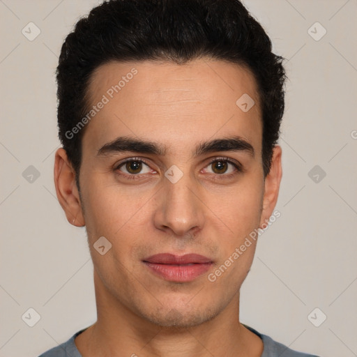 Joyful white young-adult male with short  black hair and brown eyes