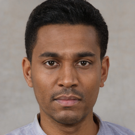 Neutral black young-adult male with short  black hair and brown eyes