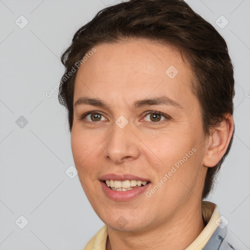 Joyful white adult female with short  brown hair and brown eyes