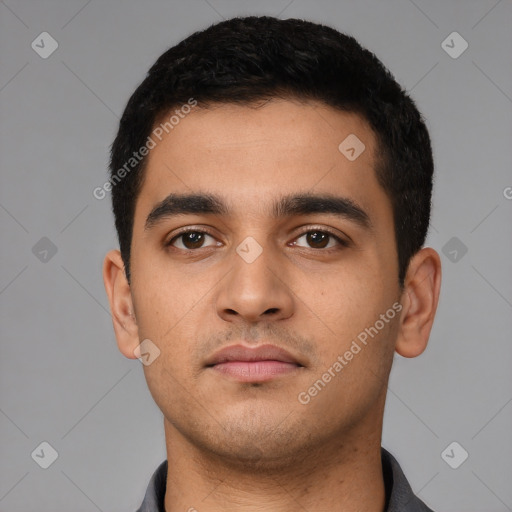 Neutral latino young-adult male with short  black hair and brown eyes