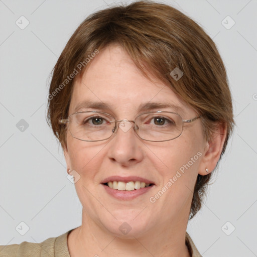 Joyful white adult female with medium  brown hair and grey eyes