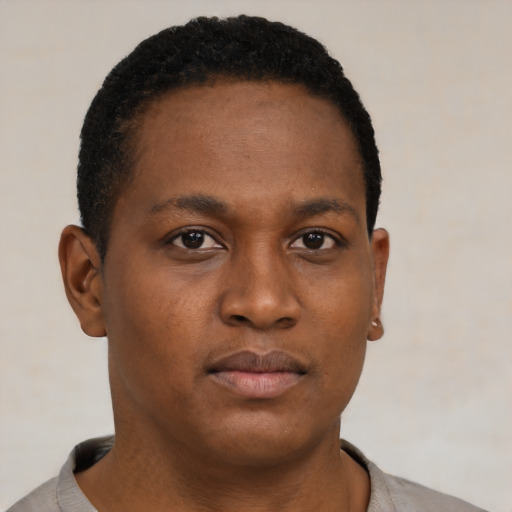 Neutral black young-adult male with short  brown hair and brown eyes