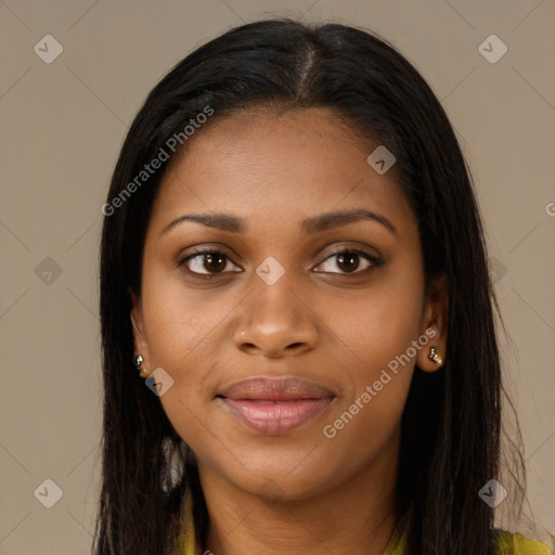 Joyful black young-adult female with long  brown hair and brown eyes