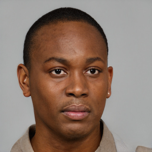 Neutral black young-adult male with short  brown hair and brown eyes